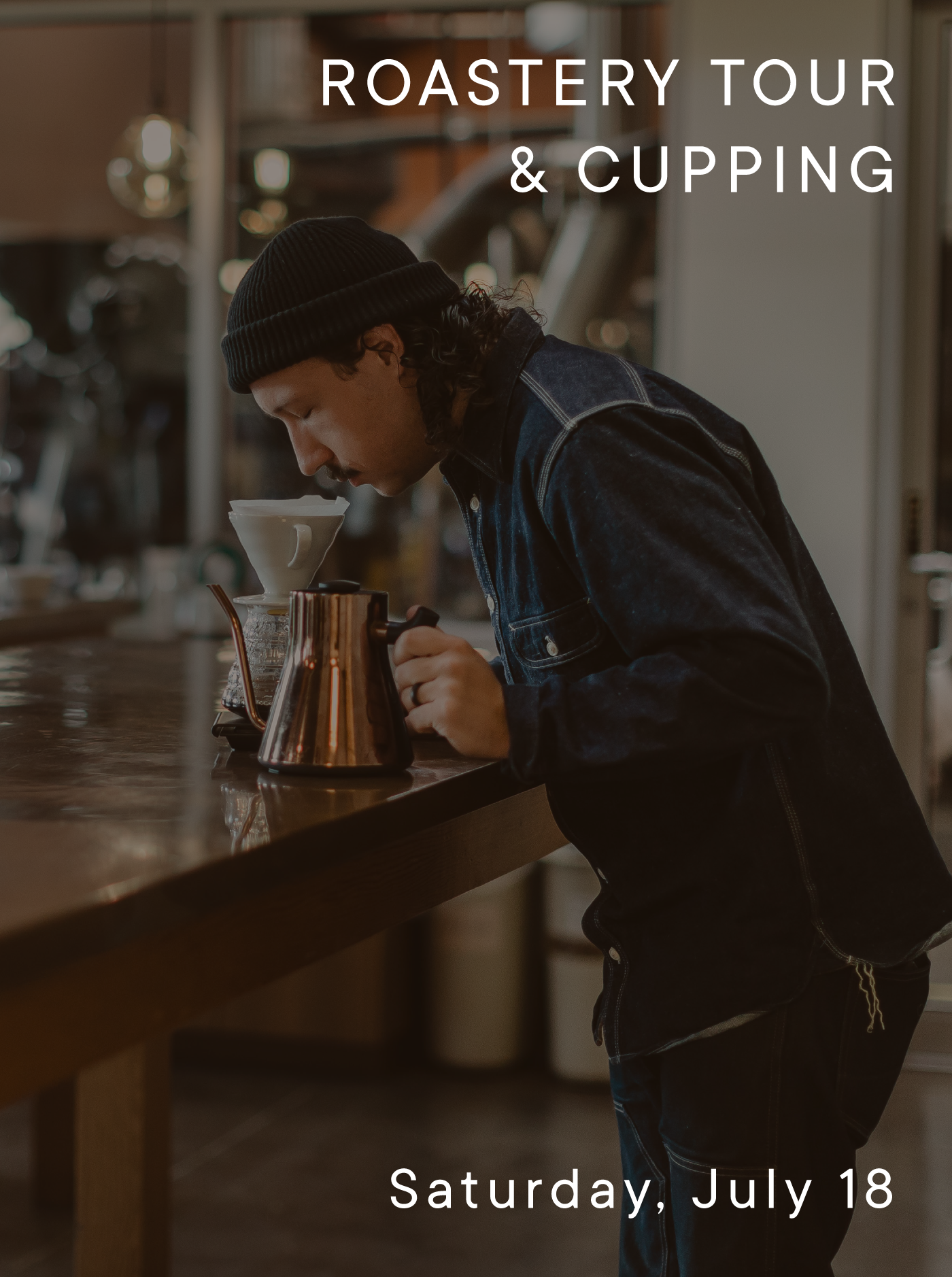 Person preparing coffee at a roastery with text overlay: Roastery Tour and Cupping Saturday July 18