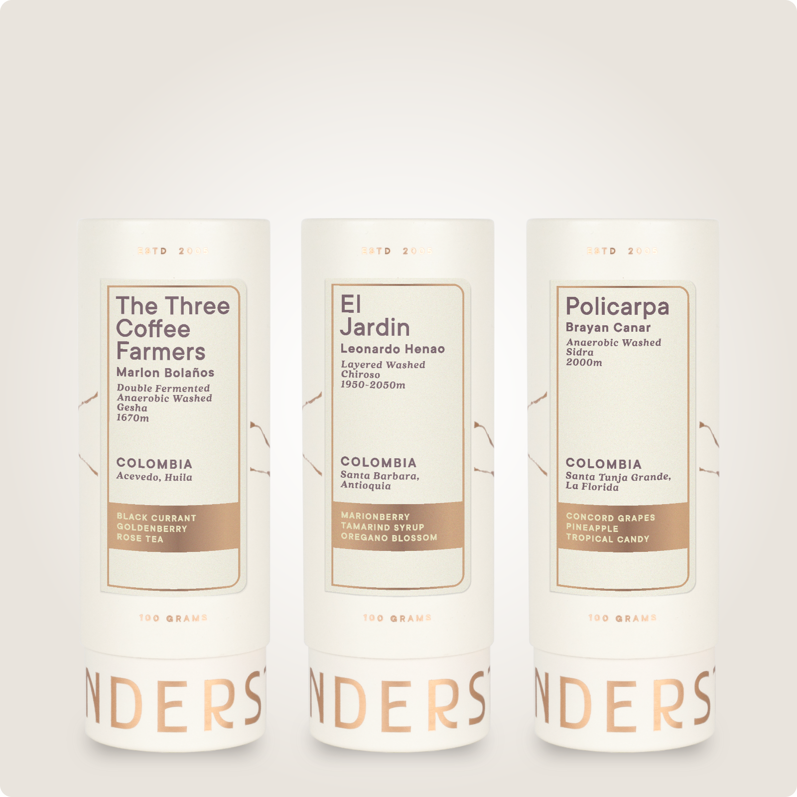 Three coffee tubes labeled 'The Three Coffee Farmers', 'El Jardin', and 'Policarpa' on a light background.